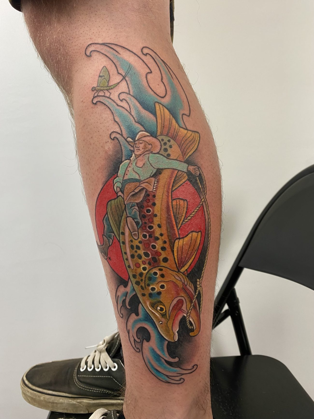 Neo-traditional cowboy riding a brown trout, in color