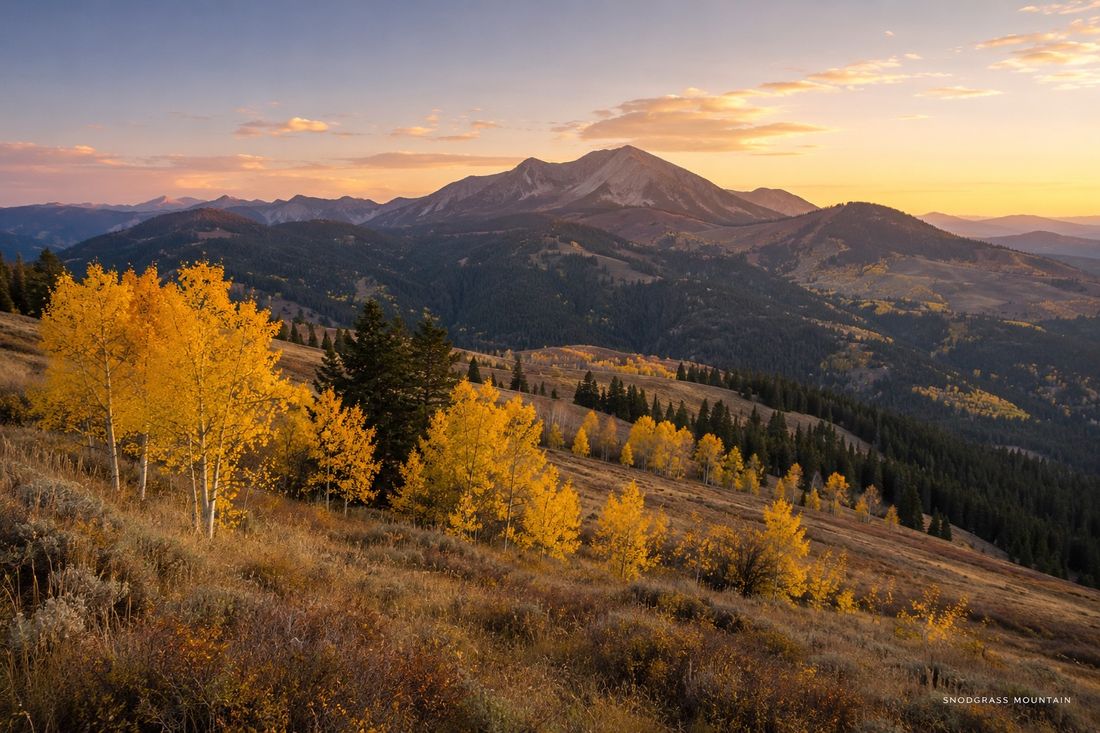 Golden aspens below Whetstone Mountain at sunset